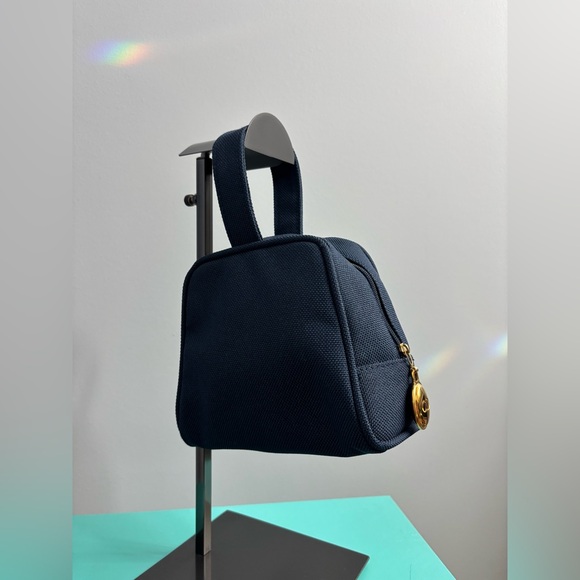 Vintage Dior perfume. Deep Blue Bag with Elegant Black Interior